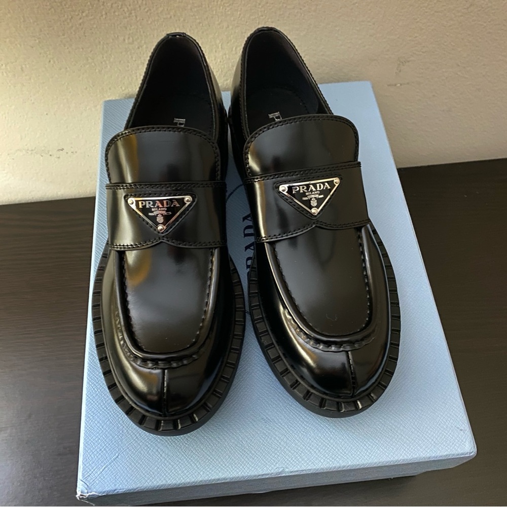 Prada triangle logo brushed leather loafers